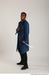 Man Adult Average Black Fighting with sword Standing poses Casual